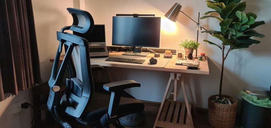 Working,corner,with,monitor,,laptop,,wooden,desk,,ergonomic,chair,and